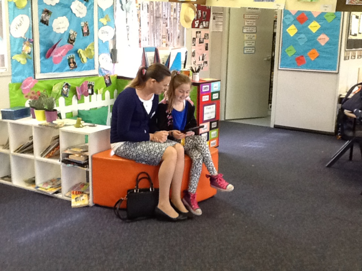 Clare and her mum spending time together reading a scripture passage. 