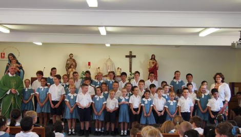 Our 2014 SRC members with Mrs La Rocca and Fr Warren. 